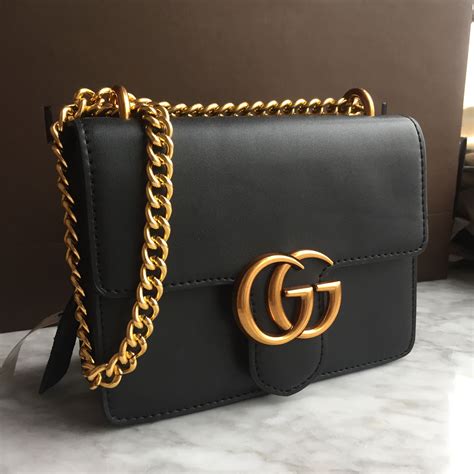 gucci black purse gold chain|Gucci small bag with chain.